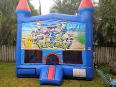 Blue castle bounce house with hoop in side Blue castle bounce house with hoop in side